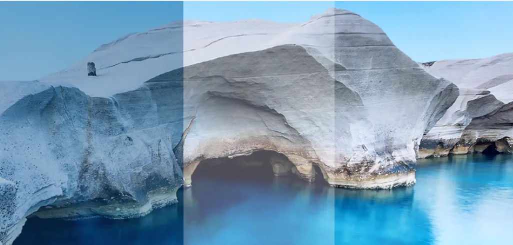 Sarakiniko smooth lunar rock formations with sea caves along the Milos north coast