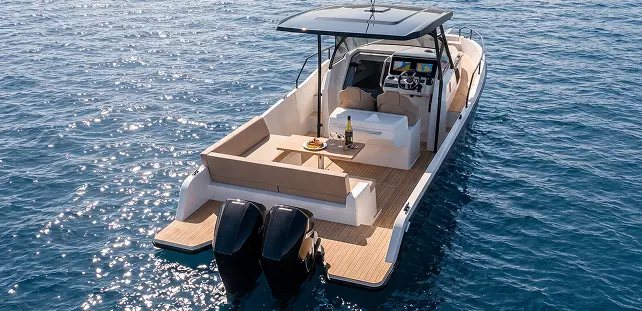 Aerial view of Ryck luxury open-yacht by Navy Blue with teak deck, lounge seating and twin 300hp outboards