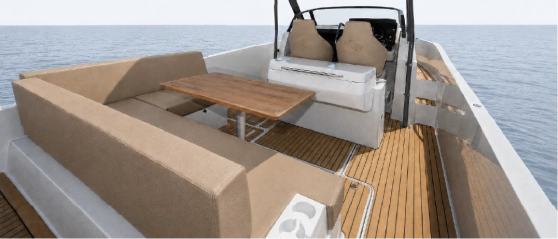 Ryck luxury open-yacht cockpit with teak deck by Navy Blue, beige lounge seating and dining table