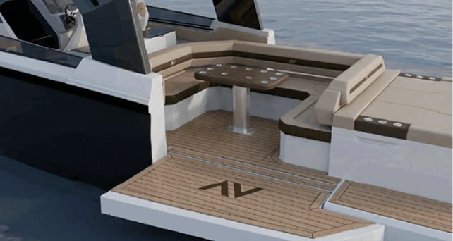 Navygon open-yacht stern by Navy Blue with a lowered teak swim platform, beige sunbed, storage cooler, and twin outboard engines