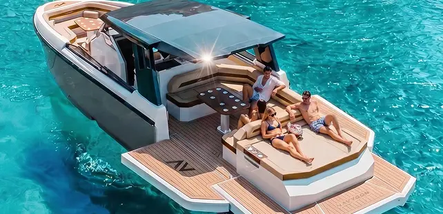 Navygon by Navy Blue aft deck with twin sunpads, three helm seats and hardtop, sea behind