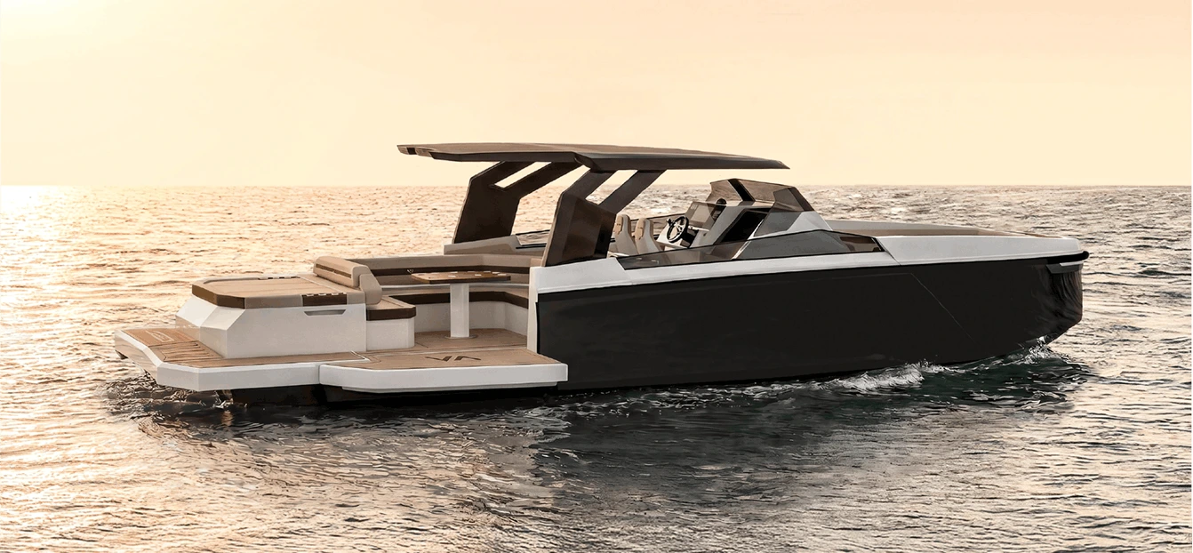 Navygon open-yacht by Navy Blue with dark hull and shaded lounge area gliding across calm water at sunset