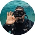Akita Sokomori, Navy Blue boat tour guest at Sikia Cave in Milos
