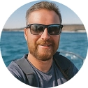 Konstantinos Pap, Navy Blue yacht cruise guest at Sikia Cave in the Cyclades