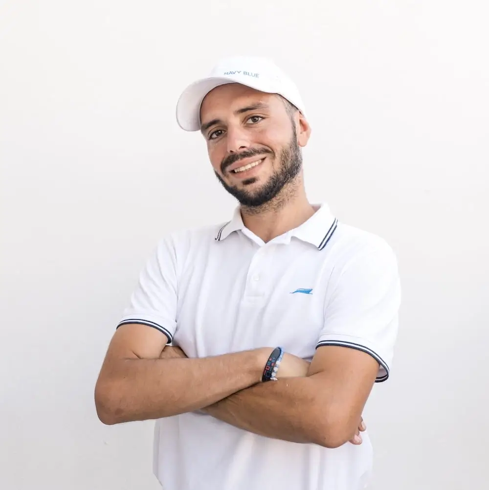 Domenikos Moustakas, Navy Blue captain and operations manager, aboard a yacht during a cruise in Milos